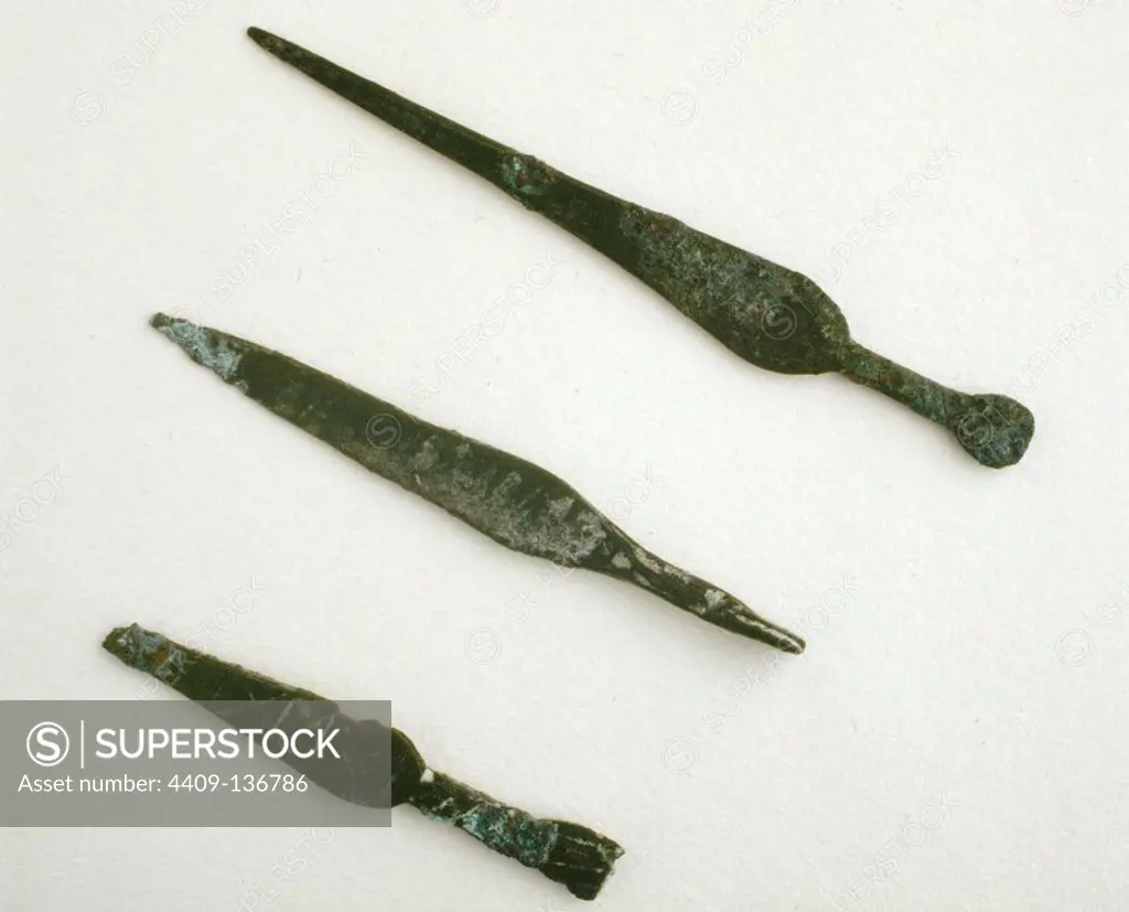 BRONZE SPATULAS (INV-TG-6027, 6928 AND 6929). FROM THE CASTLE OF TORREGROSSA, JIJONA (XII-XIII). (EXHIBITION THE SCIENTIFIC LEGACY OF AL-ANDALUS) (LOCATION: ARCHAEOLOGICAL MUSEUM OF ALICANTE).