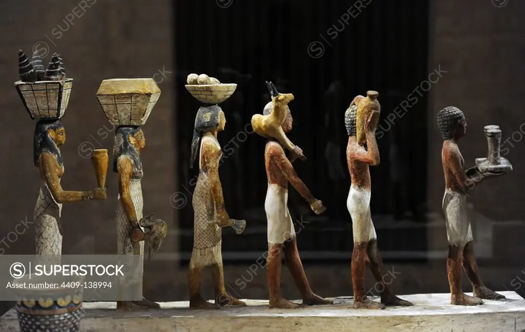 Model of a group of offering bearers. Wood. Middle Kingdom. 12th Dynasty. 1800 BC. Neues Museum. Berlin. Germany.