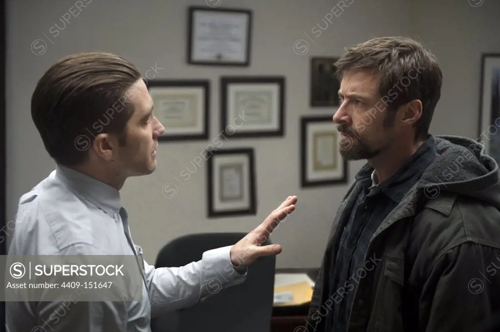 JAKE GYLLENHAAL and HUGH JACKMAN in PRISIONERS (2013) -Original title: PRISONERS-, directed by DENIS VILLENEUVE. Copyright: Editorial use only. No merchandising or book covers. This is a publicly distributed handout. Access rights only, no license of copyright provided. Only to be reproduced in conjunction with promotion of this film.