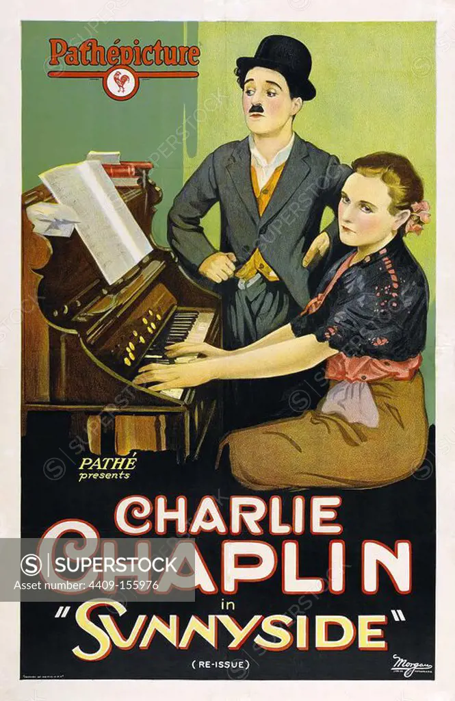 CHARLIE CHAPLIN in SUNNYSIDE (1919), directed by CHARLIE CHAPLIN.