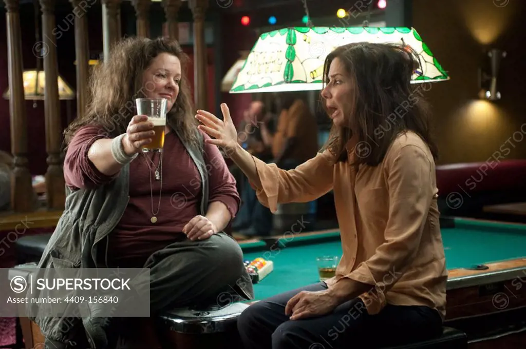 SANDRA BULLOCK and MELISSA MCCARTHY in THE HEAT (2013), directed by PAUL FEIG.