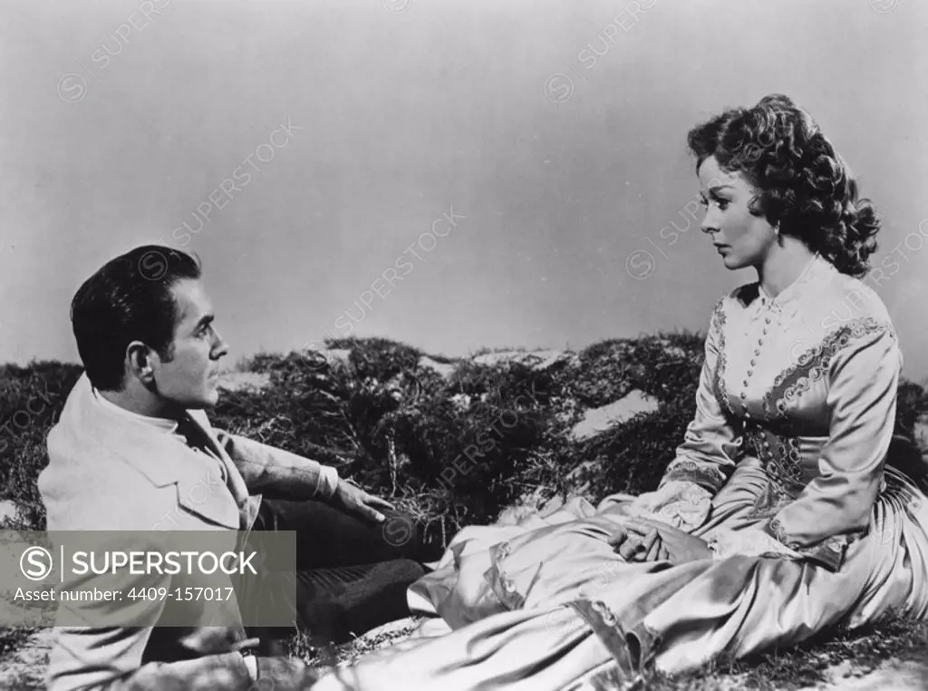 SUSAN HAYWARD and TYRONE POWER in UNTAMED (1955), directed by HENRY KING.