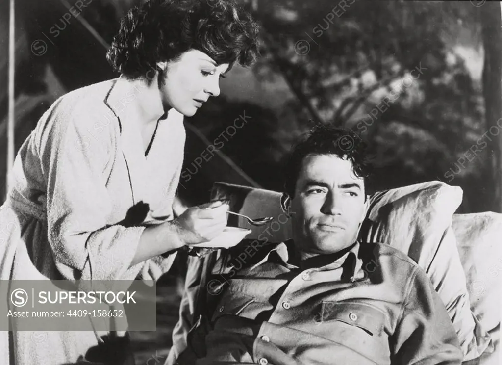 SUSAN HAYWARD and GREGORY PECK in THE SNOWS OF KILIMANJARO (1952), directed by HENRY KING.