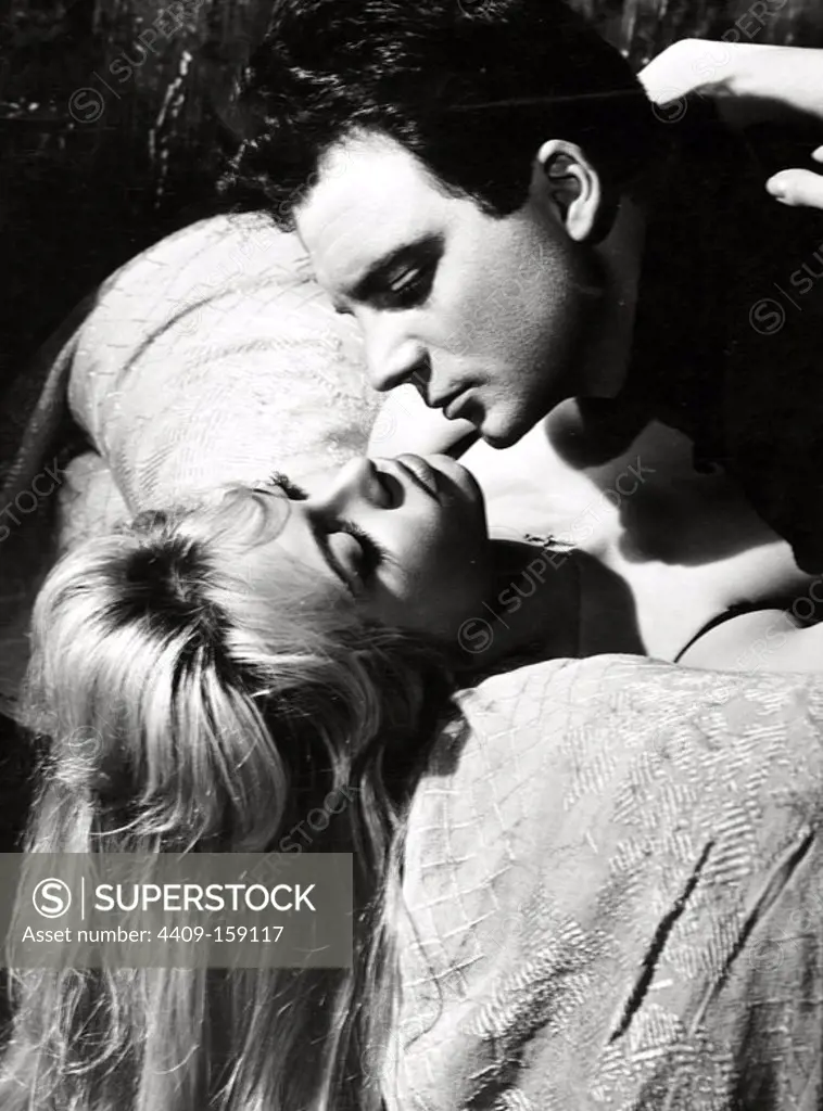 BRIGITTE BARDOT and FRANCO INTERLENGHI in LOVE IS MY PROFESSION (1958) -Original title: EN CAS DE MALHEUR-, directed by CLAUDE AUTANT-LARA.