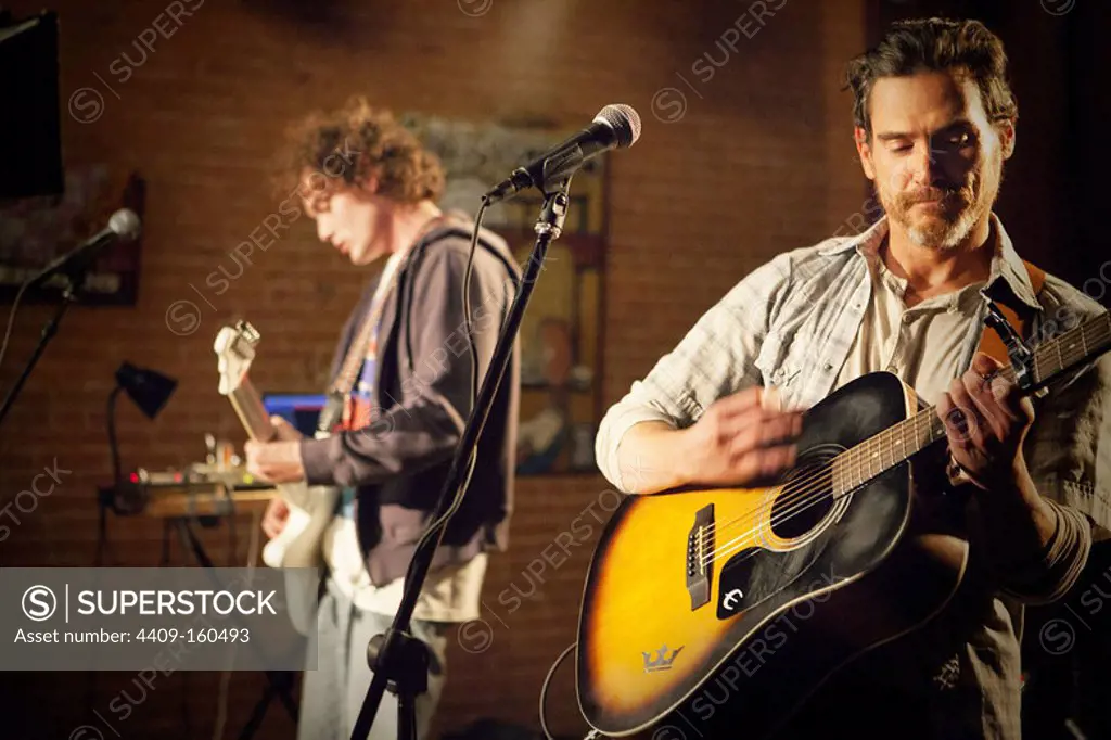 BILLY CRUDUP and ANTON YELCHIN in RUDDERLESS (2014), directed by WILLIAM H. MACY.