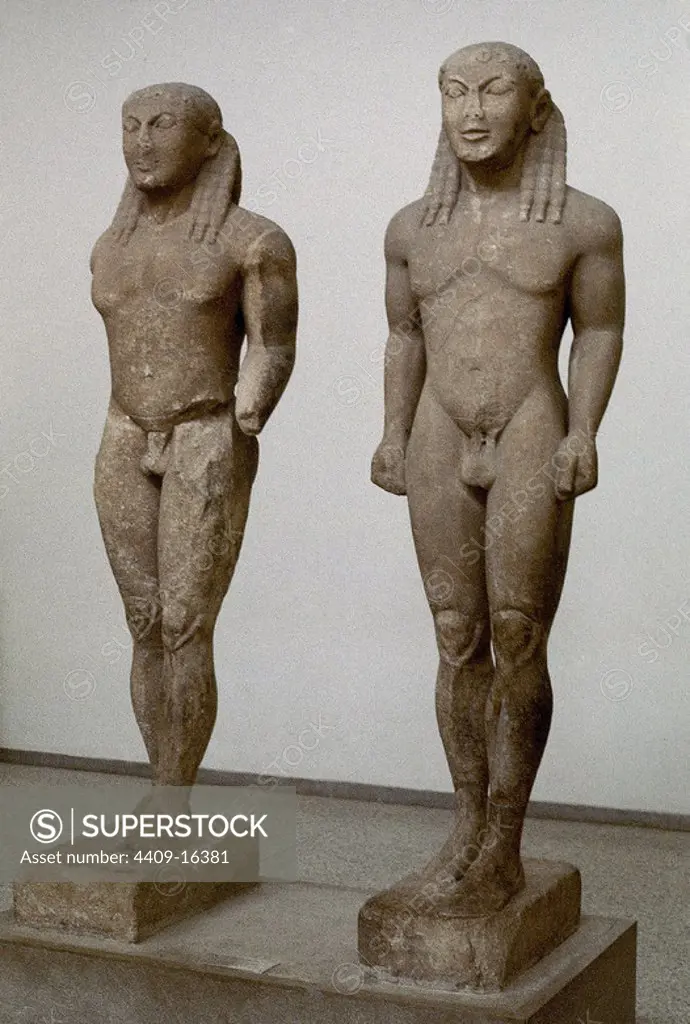Statues of Kleobis and Biton, standing like kouros.. Greece, archaeological museum of Delphi. Location: MUSEO. DELPHI. GREECE. Biton. KLEOBIS O CLEOBIS.