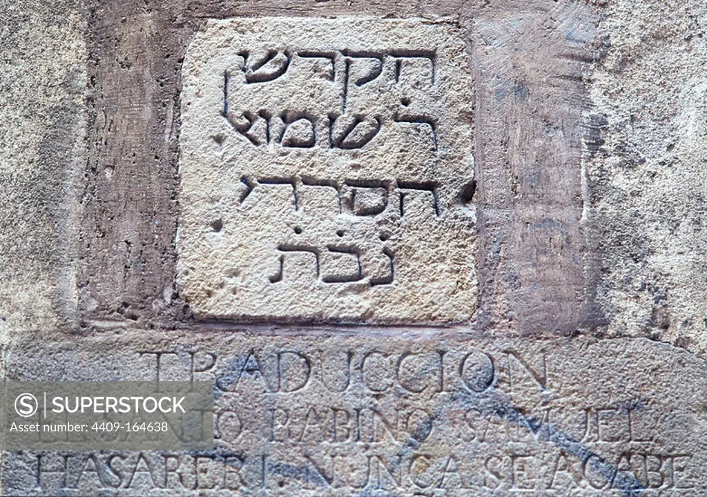 Jewish tombstone embedded in a wall of the Marlet Street, Barcelona. Reproduction of original tombstone.