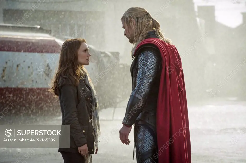 NATALIE PORTMAN and CHRIS HEMSWORTH in THOR: THE DARK WORLD (2013), directed by ALAN TAYLOR.
