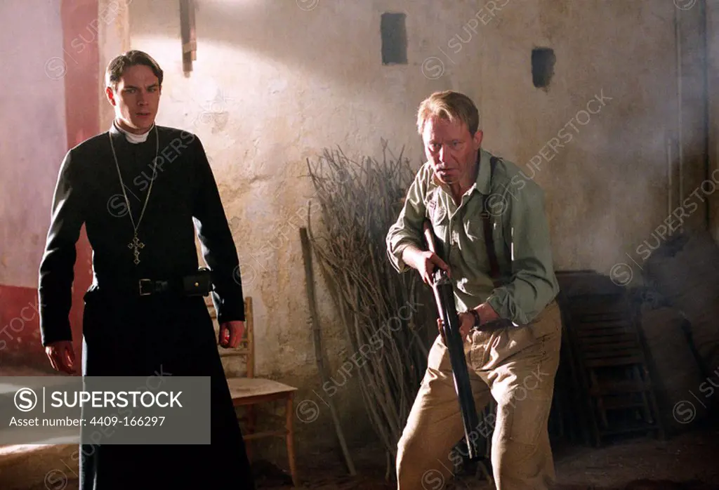 STELLAN SKARSGARD and JAMES D'ARCY in EXORCIST: THE BEGINNING (2004), directed by RENNY HARLIN. Copyright: Editorial use only. No merchandising or book covers. This is a publicly distributed handout. Access rights only, no license of copyright provided. Only to be reproduced in conjunction with promotion of this film.