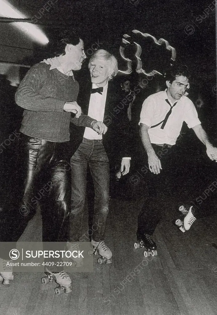 Andy Warhol (1928-1987), American artist, founder of the Pop Art movement, skating.