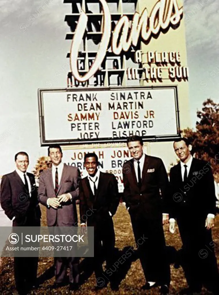 Frank Sinatra, Dean Martin,  Sammy Davis Jr. , Peter Lawford, Joey Bishop; know as, "The Rat Pack" standing in front of the Sands marquee.