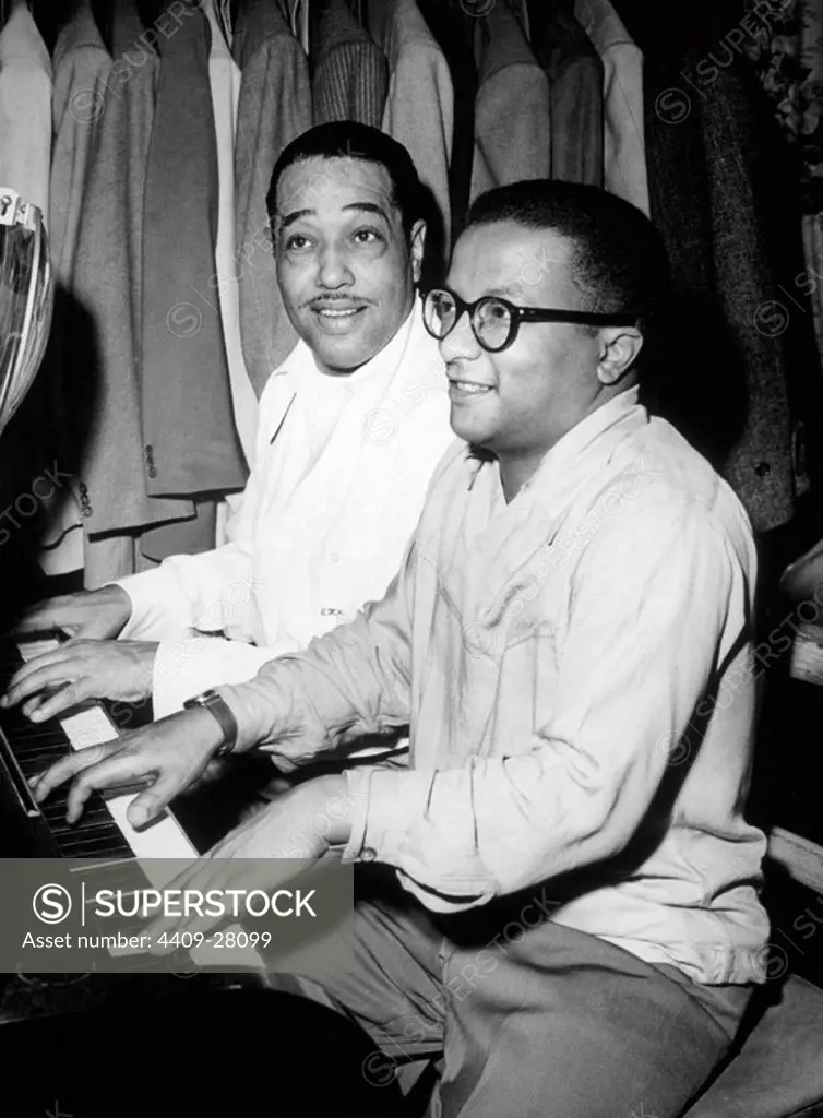 American jazz musicians Duke Ellington and Billy Strayhorn play the piano together. 1948.