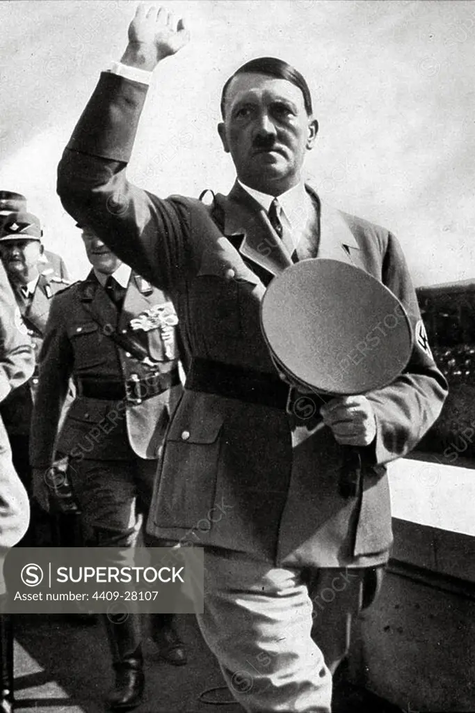 Adolf Hitler with the workers at the Zeppelin field at Nuremberg on Reichs Party Day, 1935.
