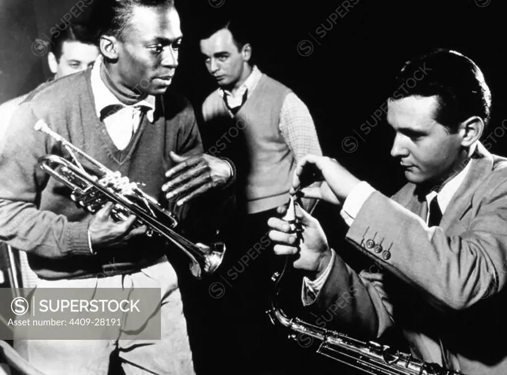 Tenor saxophonist Stan Getz and trumpeter Miles Davis at a recording session in New York City, 1951.