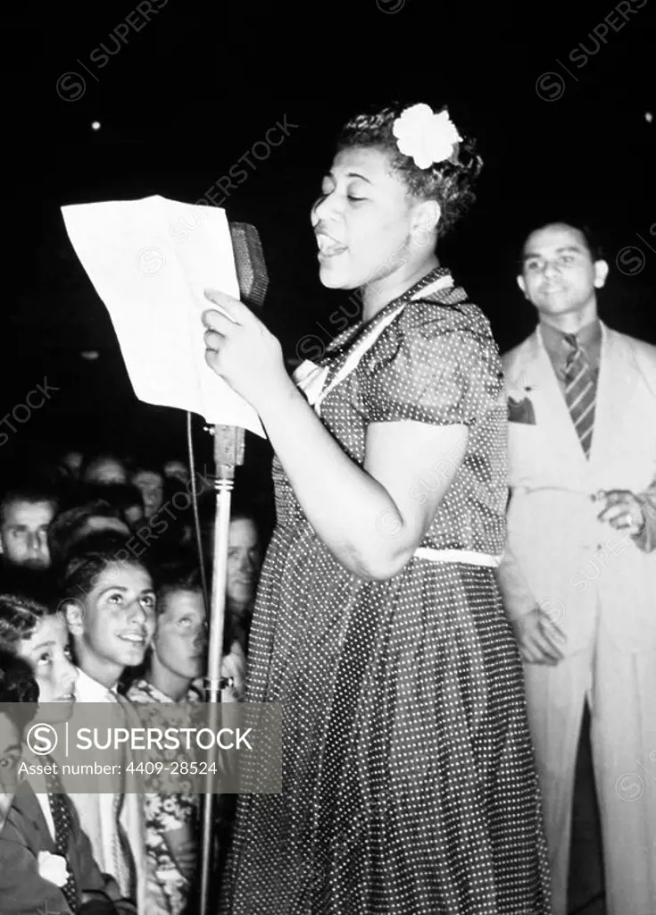 Ella Fitzgerald with Chick Webb and His Orchestra at The Ashburg Park Casino in 1938.
