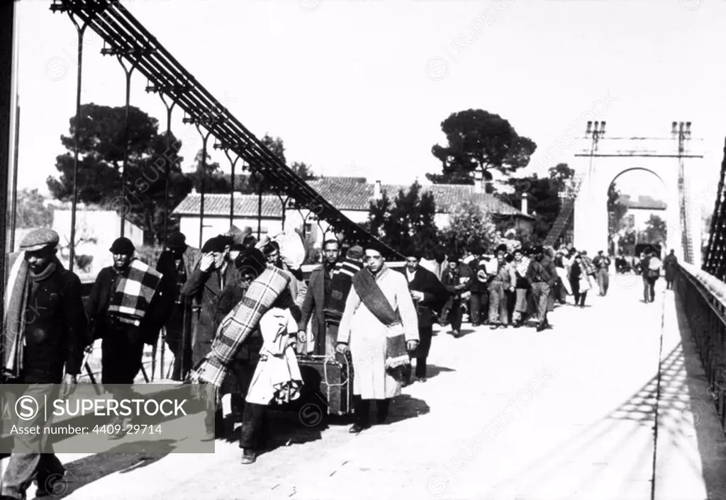 Spanish Civil War. Militiamen across the international bridge near Perpignan. February, 6 1944.