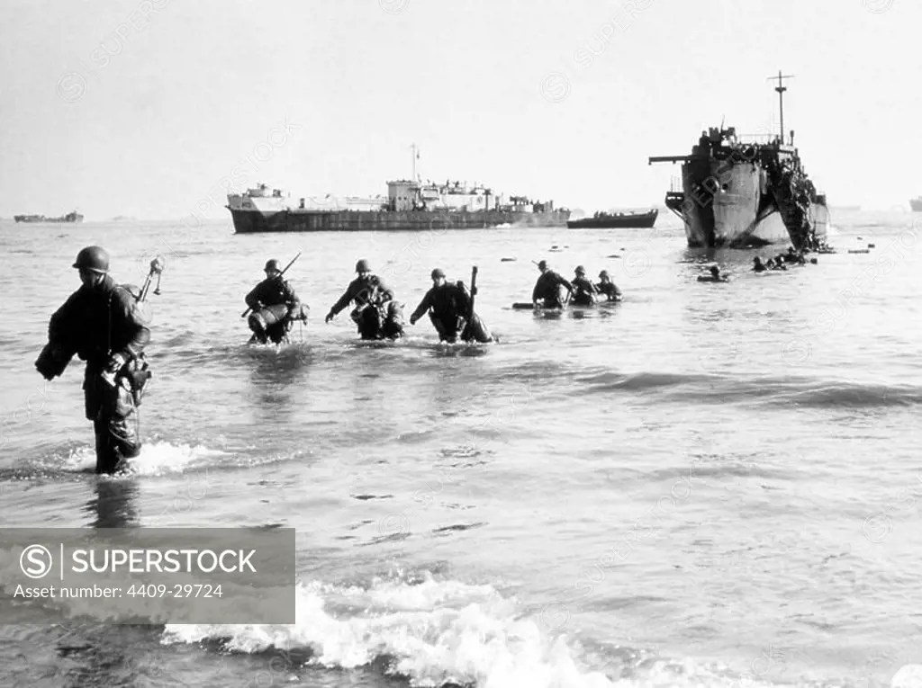 U.S. Fifth Army troops wade ashore at Anzio, Italy 22 Jan 1944.