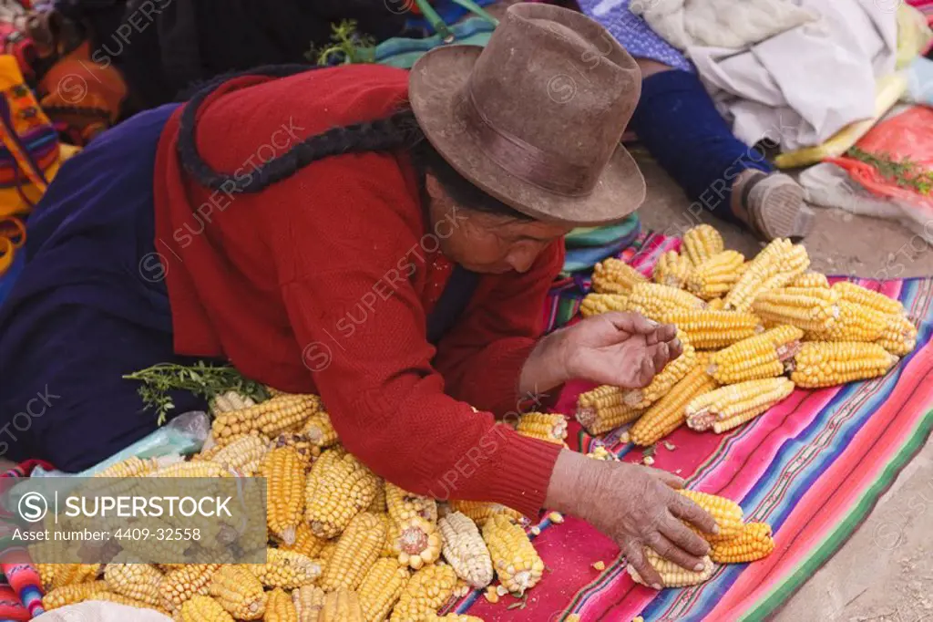 Woman Street Vendor in Pisac Market. Sacred Valley. Cusco Departament. Peru.