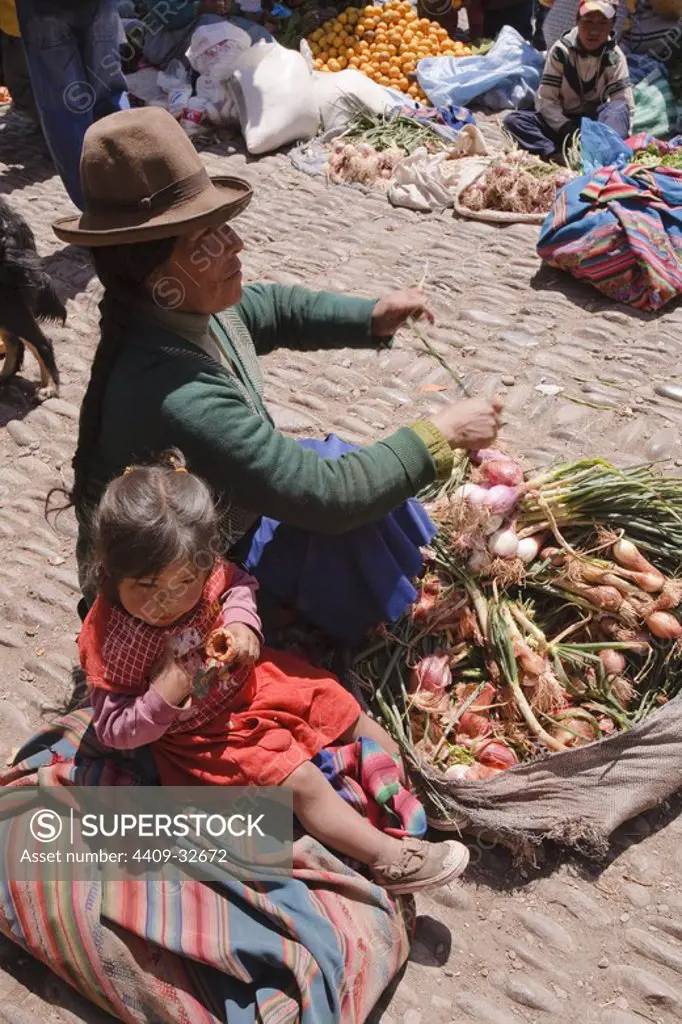 Woman Street Vendor in Pisac Market. Sacred Valley. Cusco Departament. Peru.