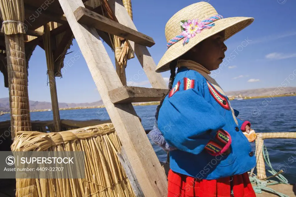 Girl in Uros Floating Islands. Titicaca Lake. Puno Departament. Peru.