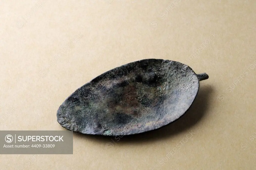 Spoon in bronze. 75 mm x 39 mm - Roman period , from the archaeological site of Complutum in Alcala de Henares (Madrid). SPAIN.