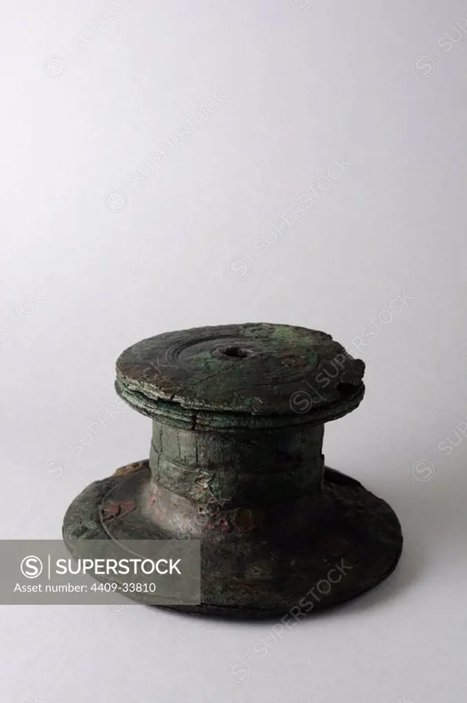 Foot bronze of a candelabrum. Base diameter 165 mm Height 81 mm . Roman period , from the archaeological site of Complutum in Alcala de Henares (Madrid). SPAIN.
