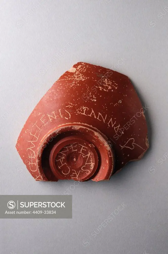 Graffiti made in writing bookshop on ceramics "Terra Sigillata " ( 2nd - 3rd CE ) - Roman period, from the archaeological site of Complutum in Alcala de Henares (Madrid). SPAIN.
