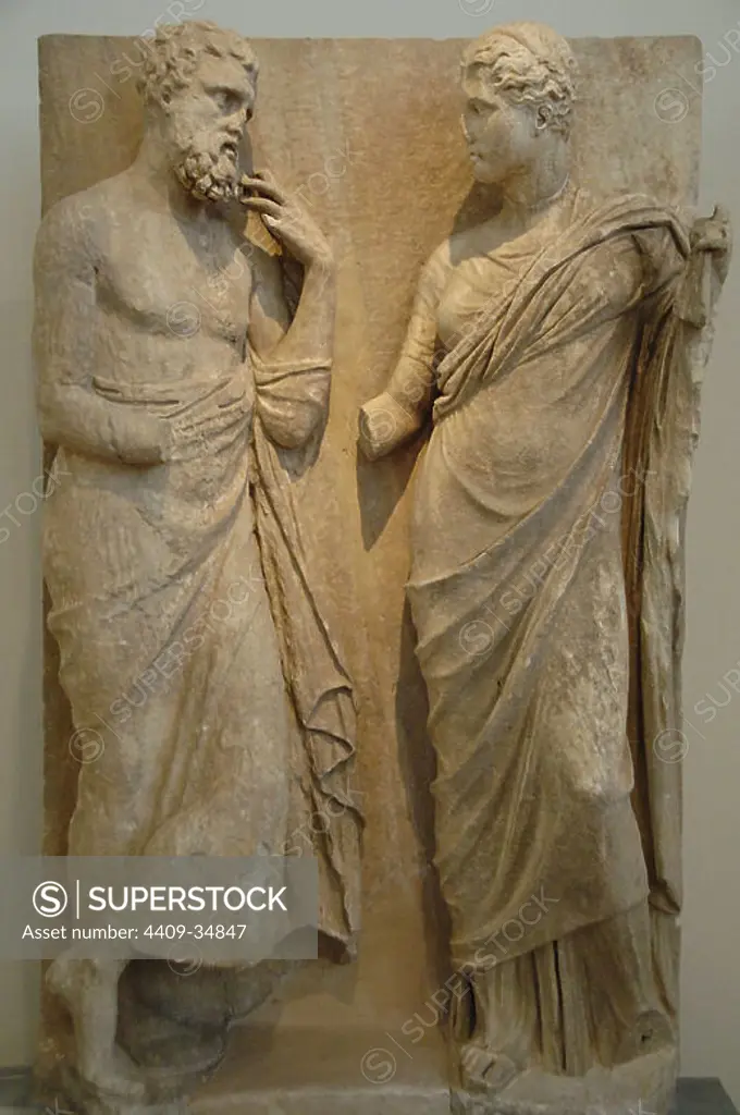 GREEK ART. Greece. IV B..C. Funerary stele of Hieron and Lysippe in penteli marble representing a man and a woman shaking hands, united even after death. The relief belongs to a naiskos of Hierokles' tomb. Dated between 325-300 years B.C. Located in Rhampous (Attica). National Archaeological Museum. Athens.