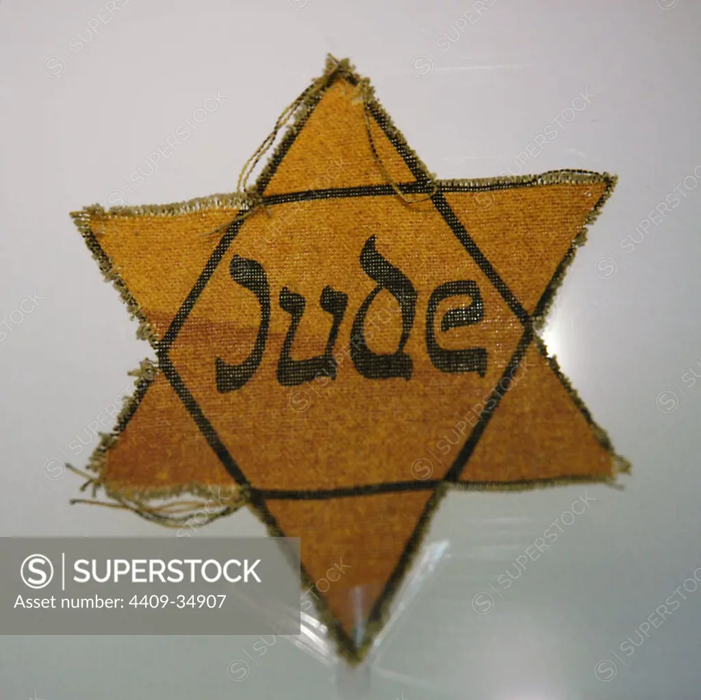 Star worn by Jewish prisoners. Sachsenhausen concentration camp Museum. Oranienburg. Germany.