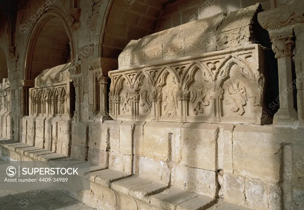 Romanesque art. Monastery of Santes Creus. Cistercian Abbey. Tombs in gothic style of the House of Queralt and House of Puigverd in the cloister. 14th century. Aiguamurcia. Catalonia. Spain.