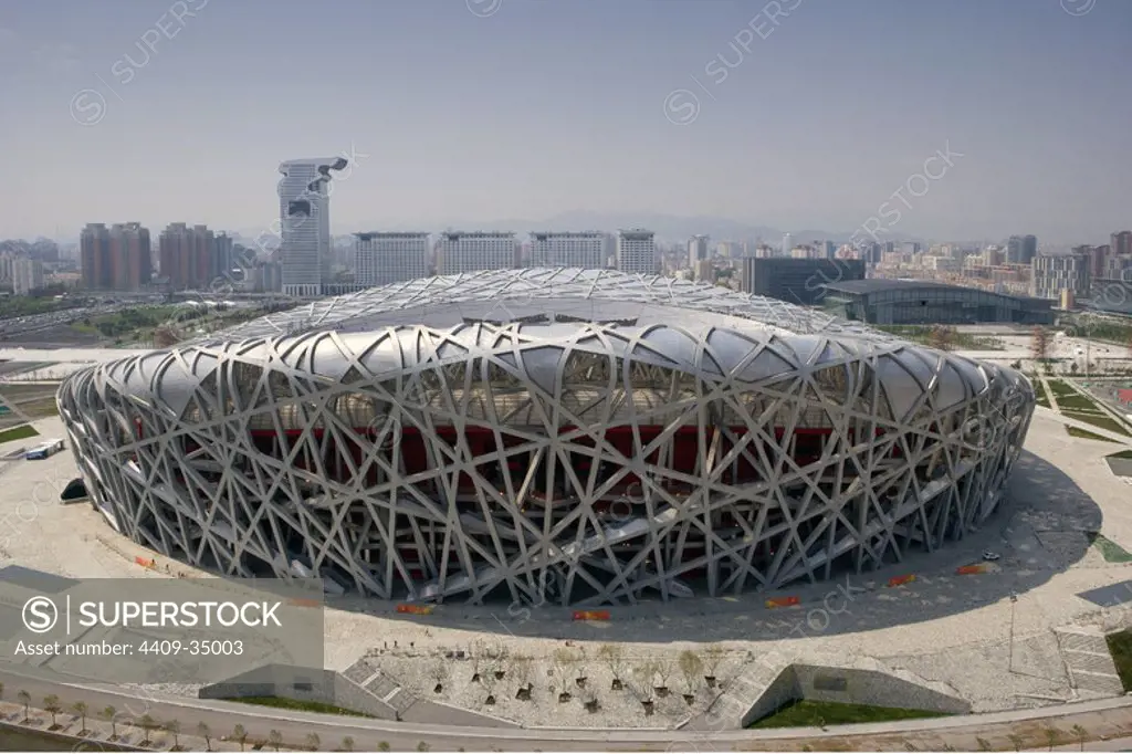 China. Beijing National Stadium (Bird's Nest), built for the 2008 Olympic Games by Jacques Herzog and Pierre de Meuron. Construction.