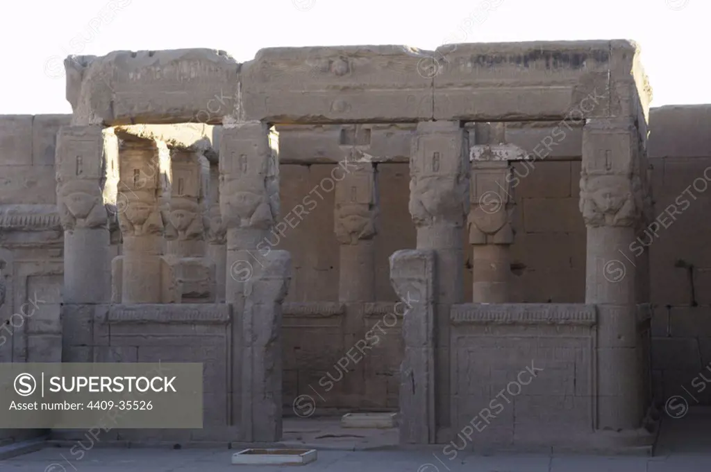 Egypt Art. Kiosk on the roof at Dendera Temple in which the ritual of the goddess's union with the sun disk was performed. It has four Hathoric columns on each side.