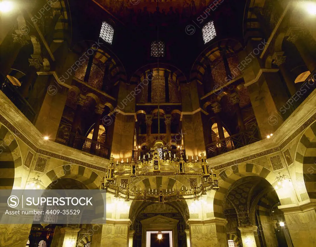 Aachen Cathedral. Palatine Chapel. Bronze chandelier provided by emperor Barbarossa. 1168. Germany.