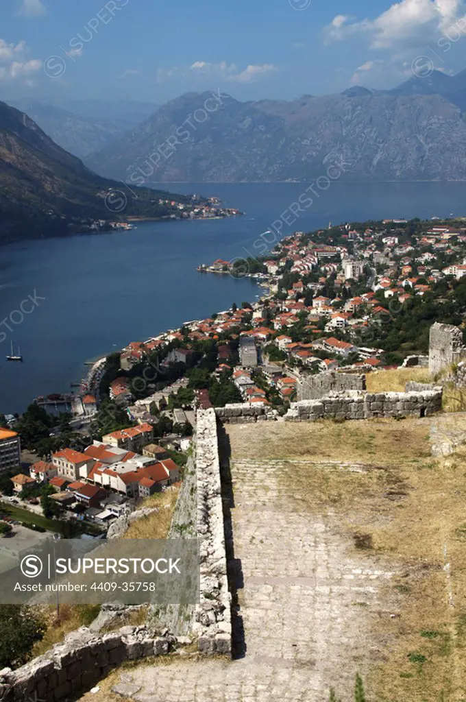 REPUBLIC OF MONTENEGRO. KOTOR. General view of the city along the fjord and the ancient wall. In 1979 UNESCO declared World Heritage the whole Natural, Cultural and Historical region of Kotor.