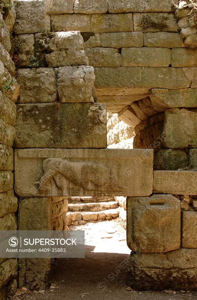 Cyclopean walls of the ancient city dating from IV century B.C. View of the gateway called Lion's Gate, one of the six entrances to the city. It shows a lion devouring a bull. Butrint. Republic of Albania.