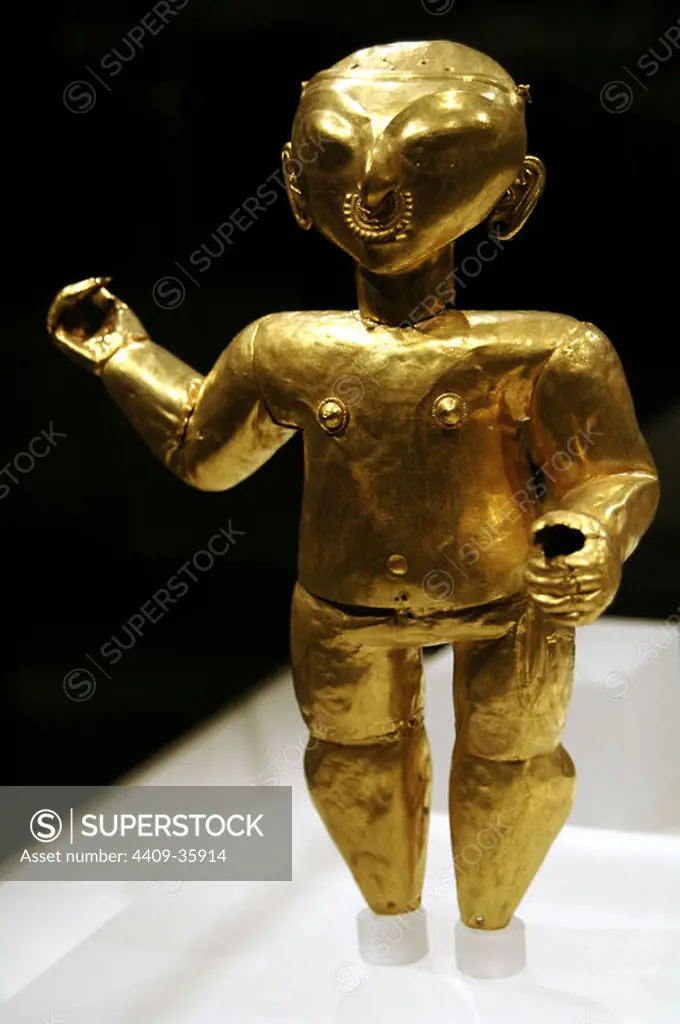 Pre-Columbian Art. Tumaco or La Tolita Culture. (600 b.C. and 200 A.C.). Standing figure. (1st. b.C.-1st. d.C.). Gold. Colombia or Ecuador. Metropolitan Museum of Art. New York. United States.