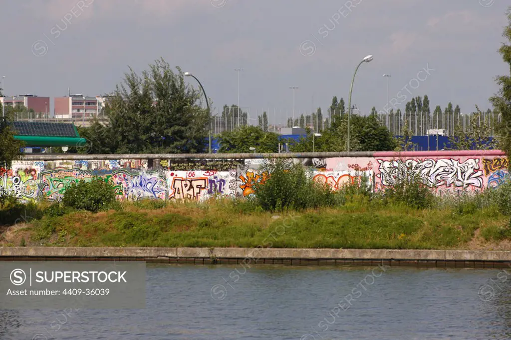 Germany. Berlin. East Side Gallery. Part of the Berlin Wall, in the city center, covered with frescoes by artists from around the world. Important outdoor museum declared National Monument (1991). First, the river Spree.