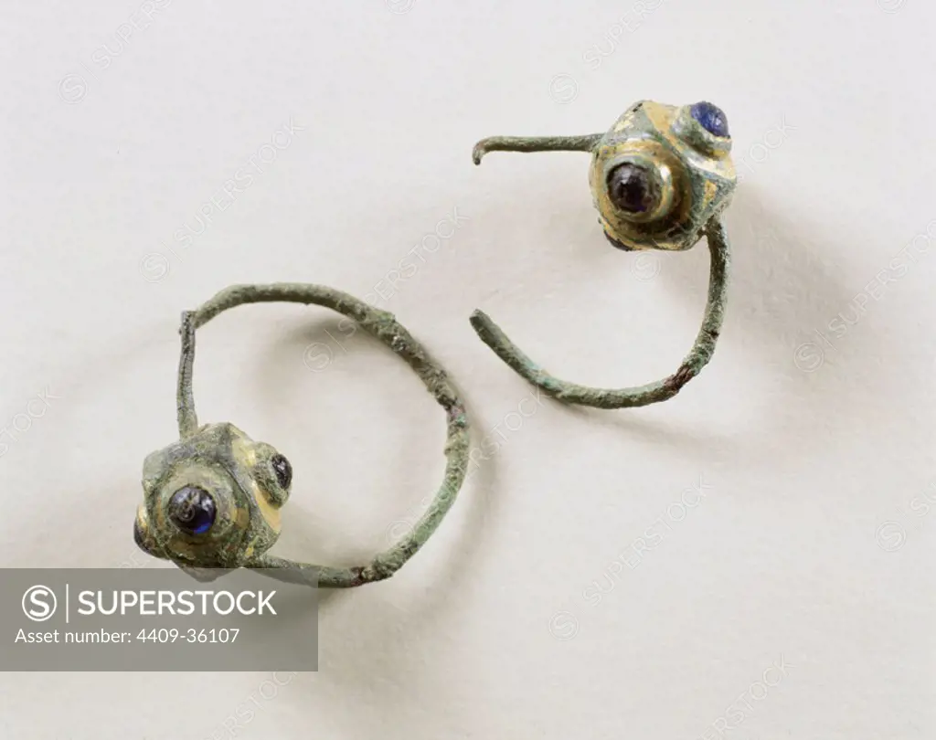 Visigothic earrings in bronze, covered with a layer of gold and glass paste. Unknown provenance. 5th-7th centuries. Archaeological Museum. Barcelona. Catalonia. Spain.