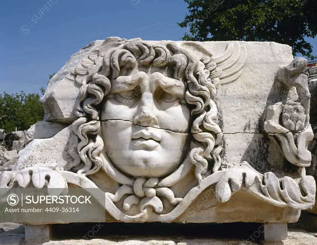 A stone-carved Madusa head. The most frightening of the three Gorgons.Turn to stone all who looked and, after her death, her head kept this power. Temple of Apollo. Didyma. Turkey.