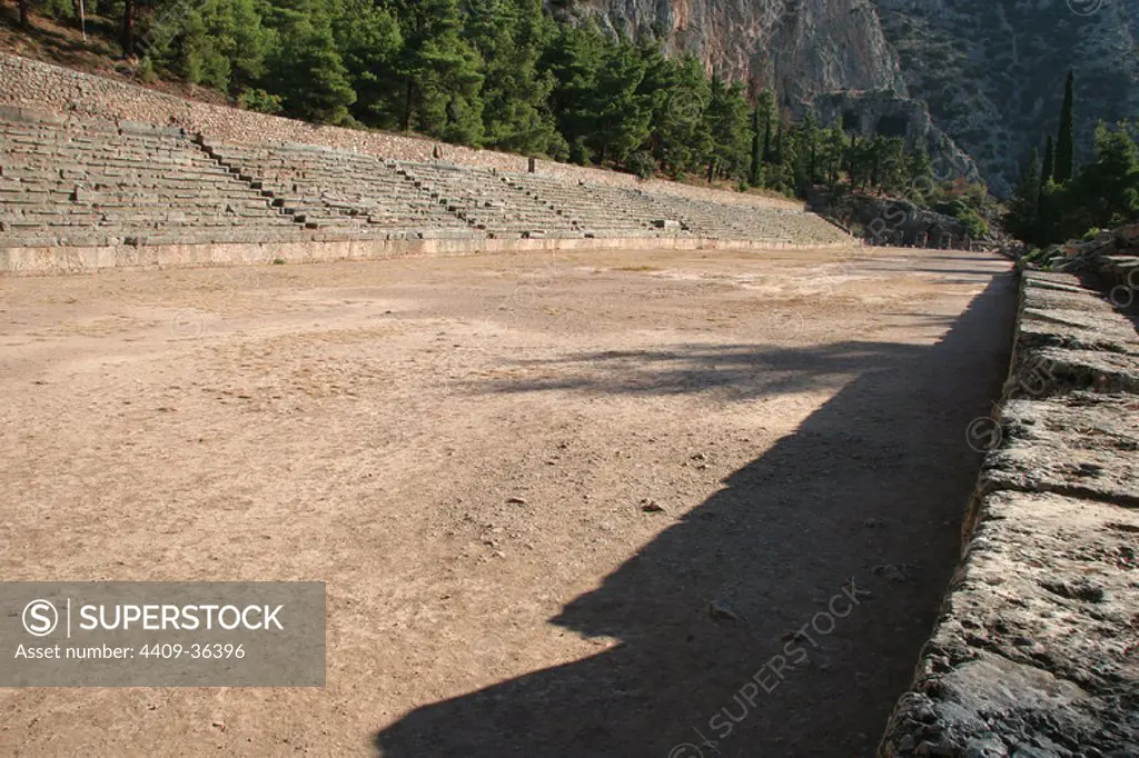Greek Art. Delphi. Archaelogical side in the Vallery of Phocis. Sanctuary of the Delphic Oracle of the good Apollo. View of the mountain-top Stadium, used for the Pythian Games. Central Greece region. Greece. Europe.