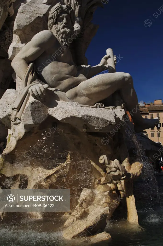 Italy. Rome. Fountain of Four Rivers, 1651, by Gian Lorenzo Bernini (1598-1680). Detail of river-god Ganges. Navona Square.