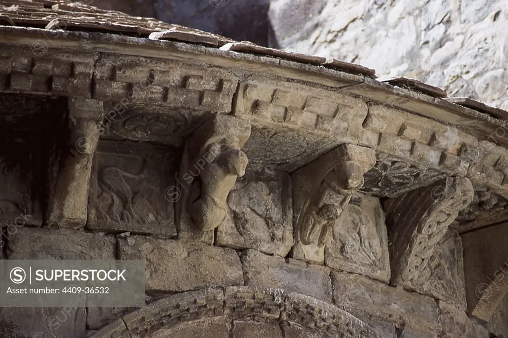 Saint Peter's Cathedral. Romanesque temple built during the kingdom of Ramiro I (1035-1063), king of Aragon. XI century. Outside view. Detail of the sculpted cornice with animals carved in the lateral apse. Jaca. Aragon. Spain.