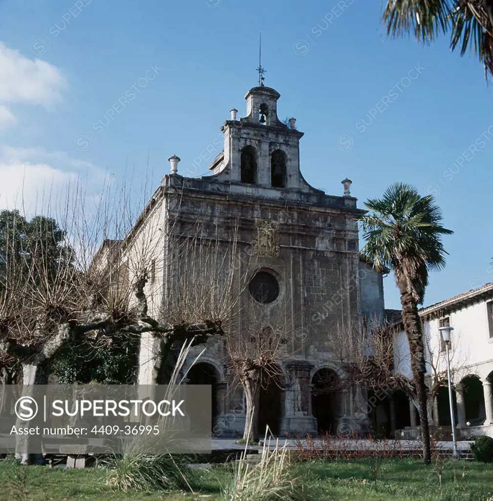 Sanctuary of Our Lady of Antigua. Built in 1743 on church of the 13th century. Facade and the steeple (1800). Ordun~a (Urdun~a). Province of Vizcaya. Basque Country. Spain.