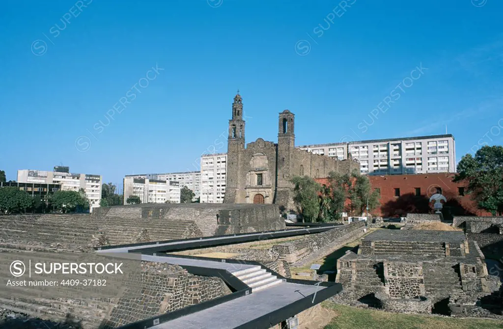 Mexico. Mexico City. Square of the Three Cultures with Tlatelolco's Aztec pyramid in the foreground and the Santiago of Tlatelolco Catholic church, built in the 16th century.