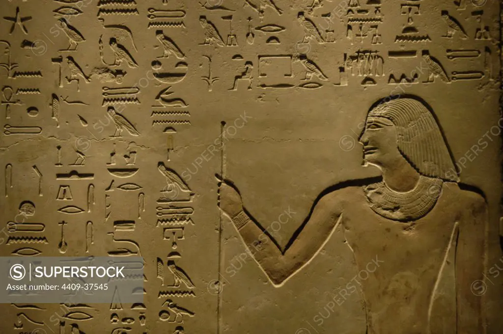 Egyptian art. Stele of the tomb of Methethi with his son Ihy with hieroglyphic writing. Detail of Methethi. Around 2400 BC. It comes from Saqqara. Old Kingdom. 5th Dynasty. Egyptian Museum (Altes Museum). Berlin. Germany.