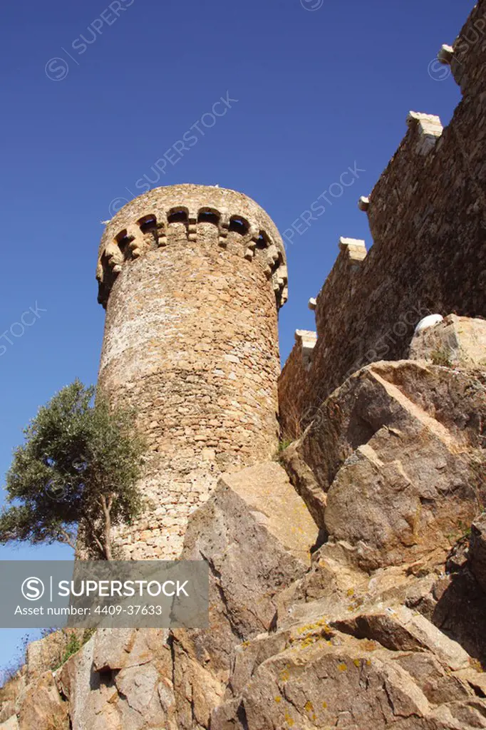 Spain. Catalonia. Tossa de Mar. Wall and tower of the Walled old village.