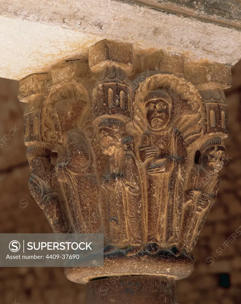 Monastery of Sant Cugat. Decorated capital of the cloister. Detail with depiction of monastic life: monks i an attitude of prayer. 12th century. Romanesque style. Sant Cugat del Valles, province of Barcelona, Catalonia, Spain.