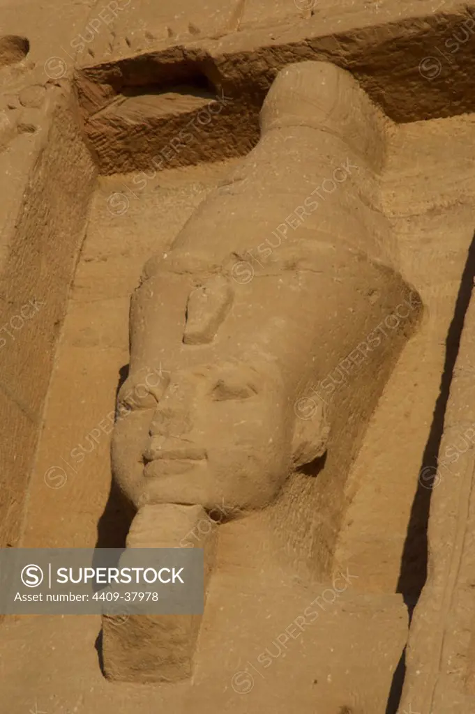 Egyptian art. Temple of Hathor or Small Temple dedicated to Nefertari. Facade depicting the pharaoh Ramses II (1290-1224 BC) with double crown and false beard. 19th dynasty. New Kingdom. Abu Simbel. Egypt.