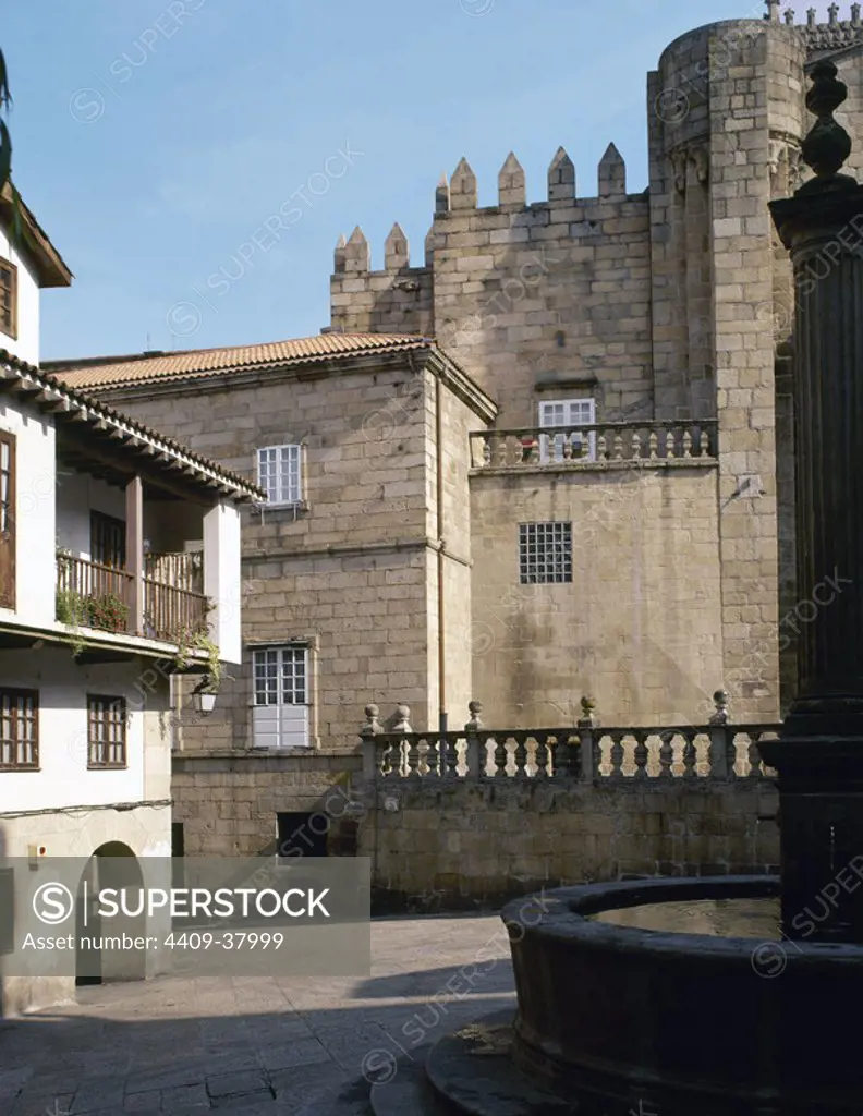 Spain. Galicia.Ourense. Plaza del Trigo (Wheat square) with a fountain. To the right, the south facade of the cathedral.