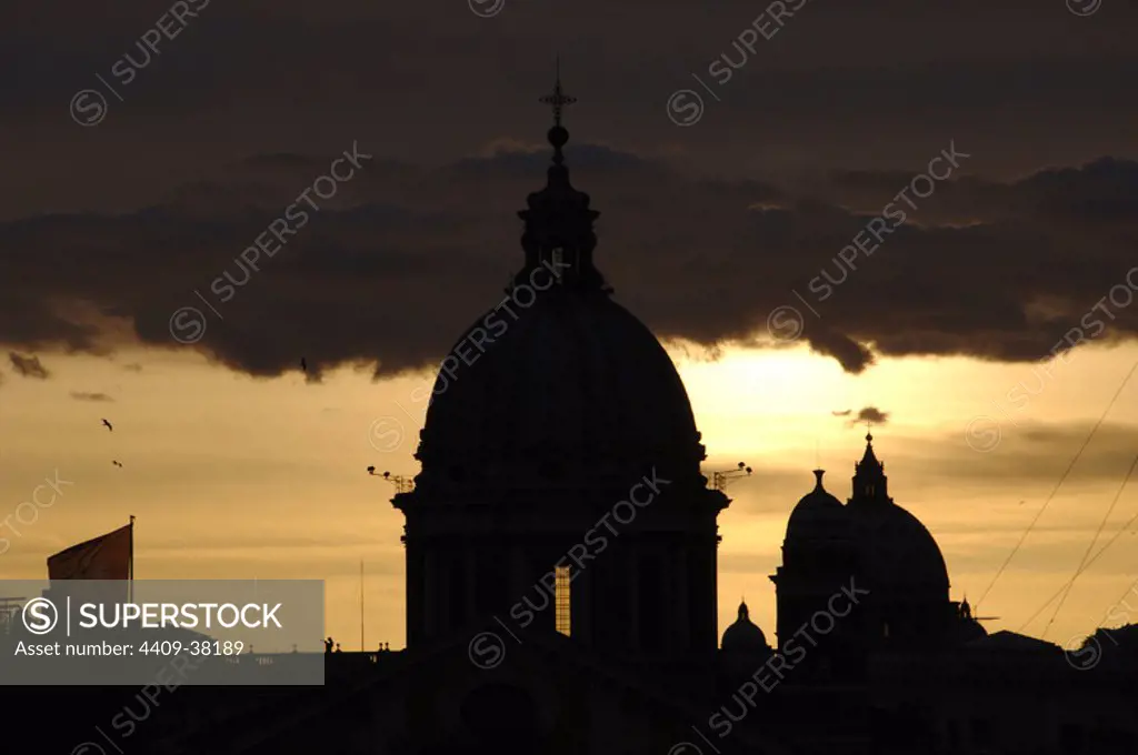 Italy. Rome. Basilica of Carlo al Corso at sunset. Backlight.